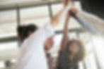 A group of people high fiving