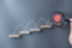 An aim hopping up different steps, or upgrading