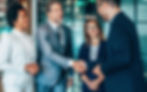 Business professionals shaking hands, symbolizing successful collaboration