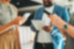 Colleagues interacting with mobile devices