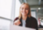 A woman filling an employee survey