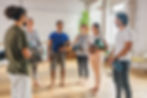 A group of colleagues ready to start their yoga class