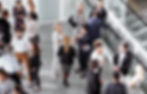 Overhead view of professionals networking and having conversations in a business environment.