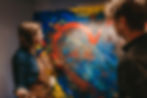 admiring an artist's skill
