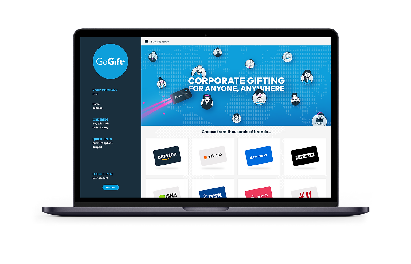 Laptop screen showing a corporate gifting web page with a slogan "CORPORATE GIFTING FOR ANYONE, ANYWHERE" and a selection of gift card options from various brands, part of the "GoGift" service platform.