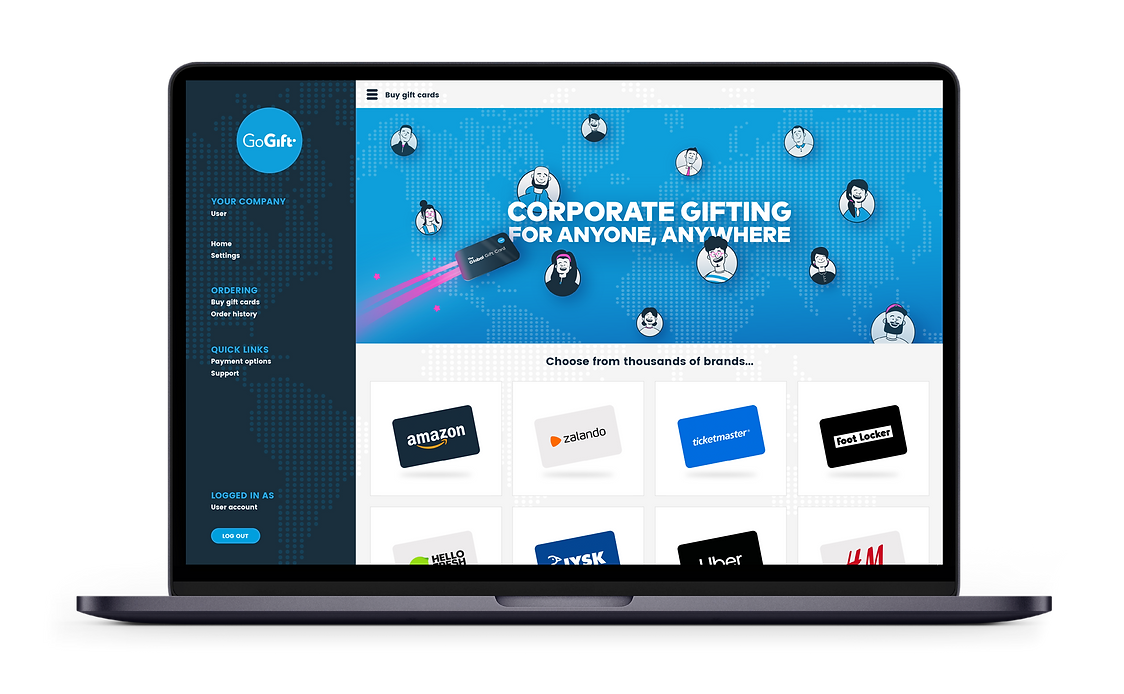 Laptop screen showing a corporate gifting web page with a slogan "CORPORATE GIFTING FOR ANYONE, ANYWHERE" and a selection of gift card options from various brands, part of the "GoGift" service platform.